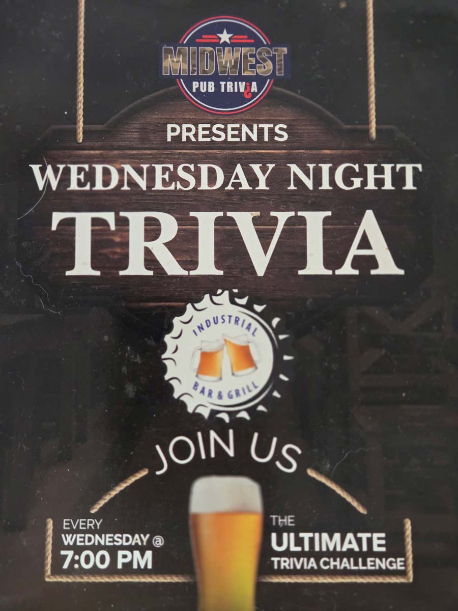 Poster for Wednesday Night Trivia at 7 PM, hosted by Midwest Pub Trivia at Industrial Bar & Grill.